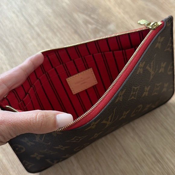 Authentic Louis Vuitton wristlet that comes in the never full. - Picture 2 of 6